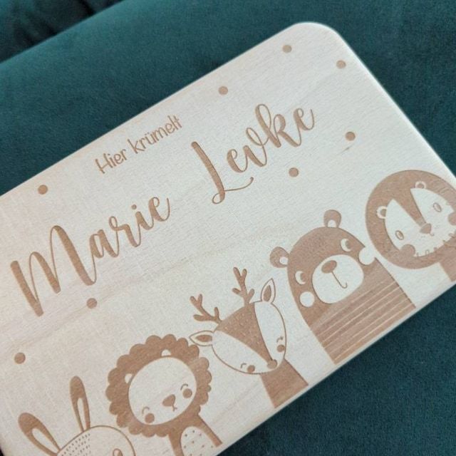 Customer photo review of Personalisiertes Frühstücksbrettchen Große Tierfamilie