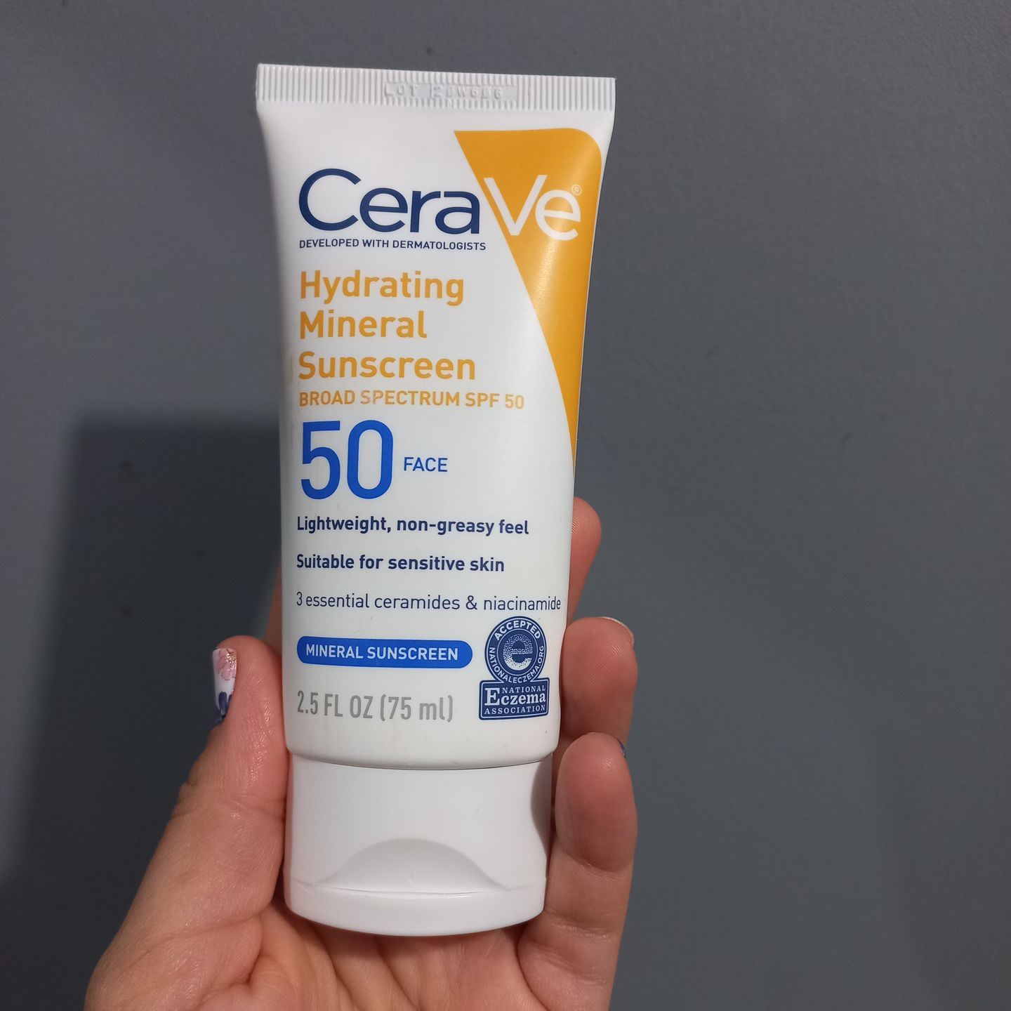 Customer photo review of Hydrating Mineral Sunscreen SPF 50 Face Lotion 75ml
