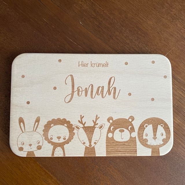 Customer photo review of Personalisiertes Frühstücksbrettchen Große Tierfamilie