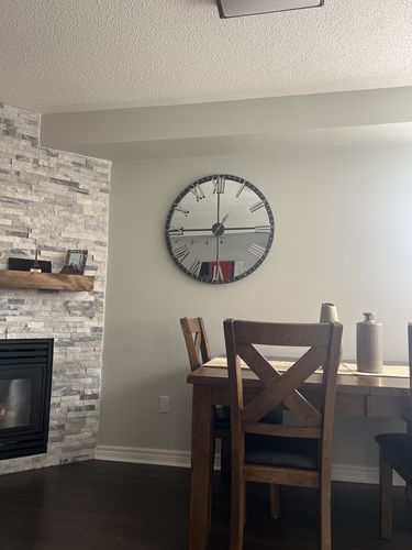 Customer photo review of 31.5" Rustic Mirrored Clock