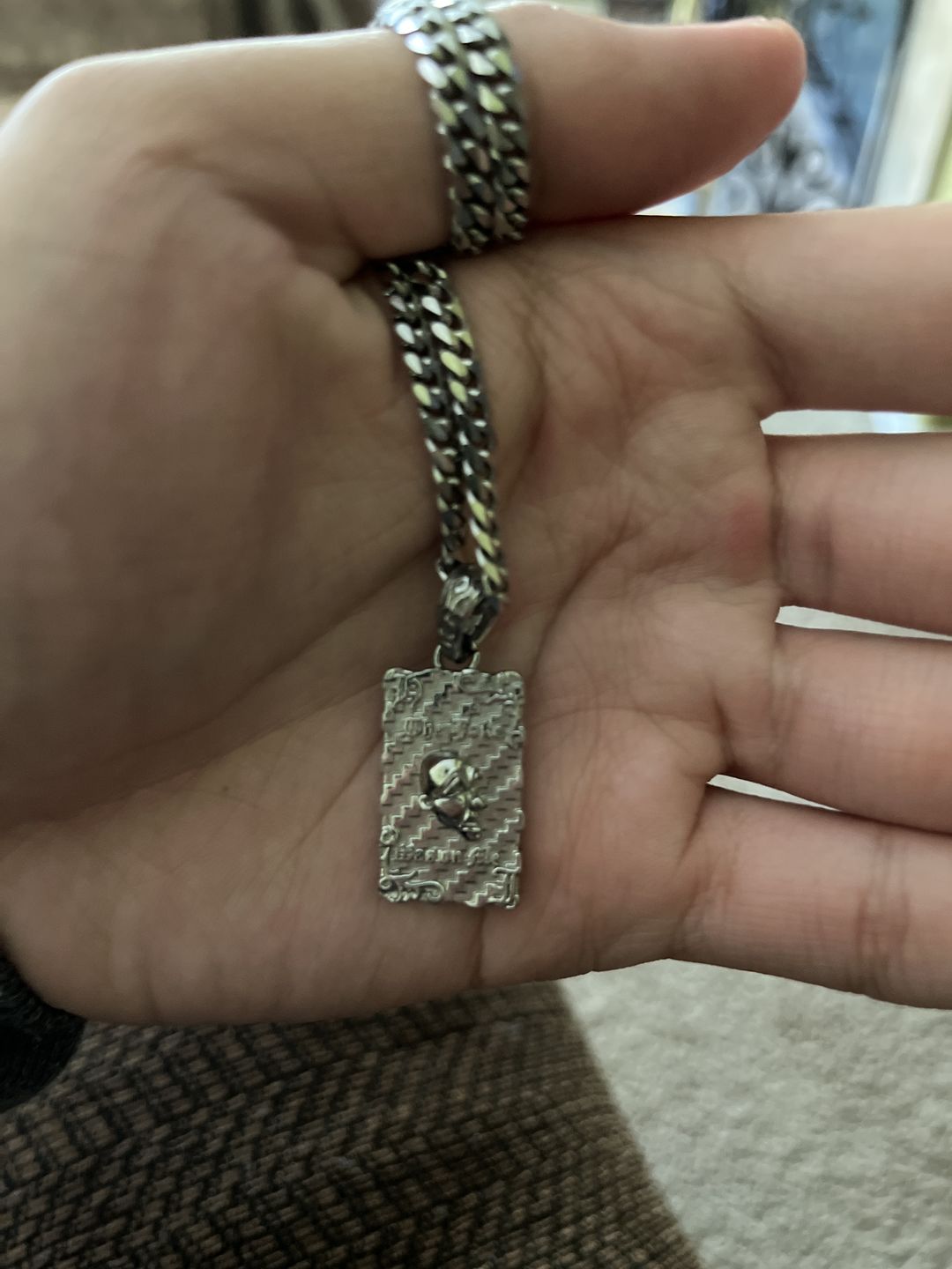 Customer photo review of LAUGH NOW, DIE LATER PENDANT