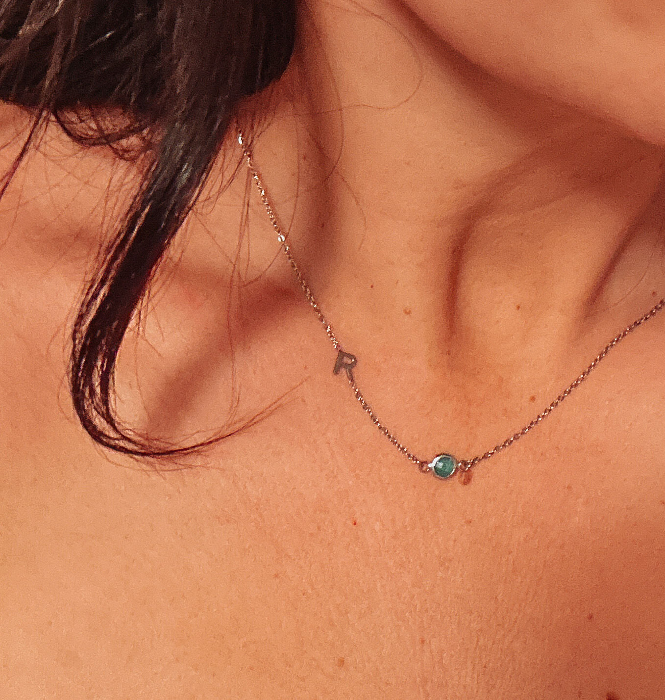 Customer photo review of Birthstone Initial Necklace