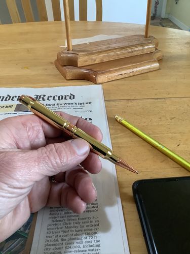Customer photo review of .308 Real Bullet Authentic Brass Casing Refillable Twist Pen - Tactical Gift Box - Polished Brass