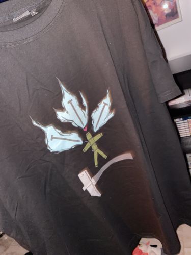 Customer photo review of Straw Doll Tee