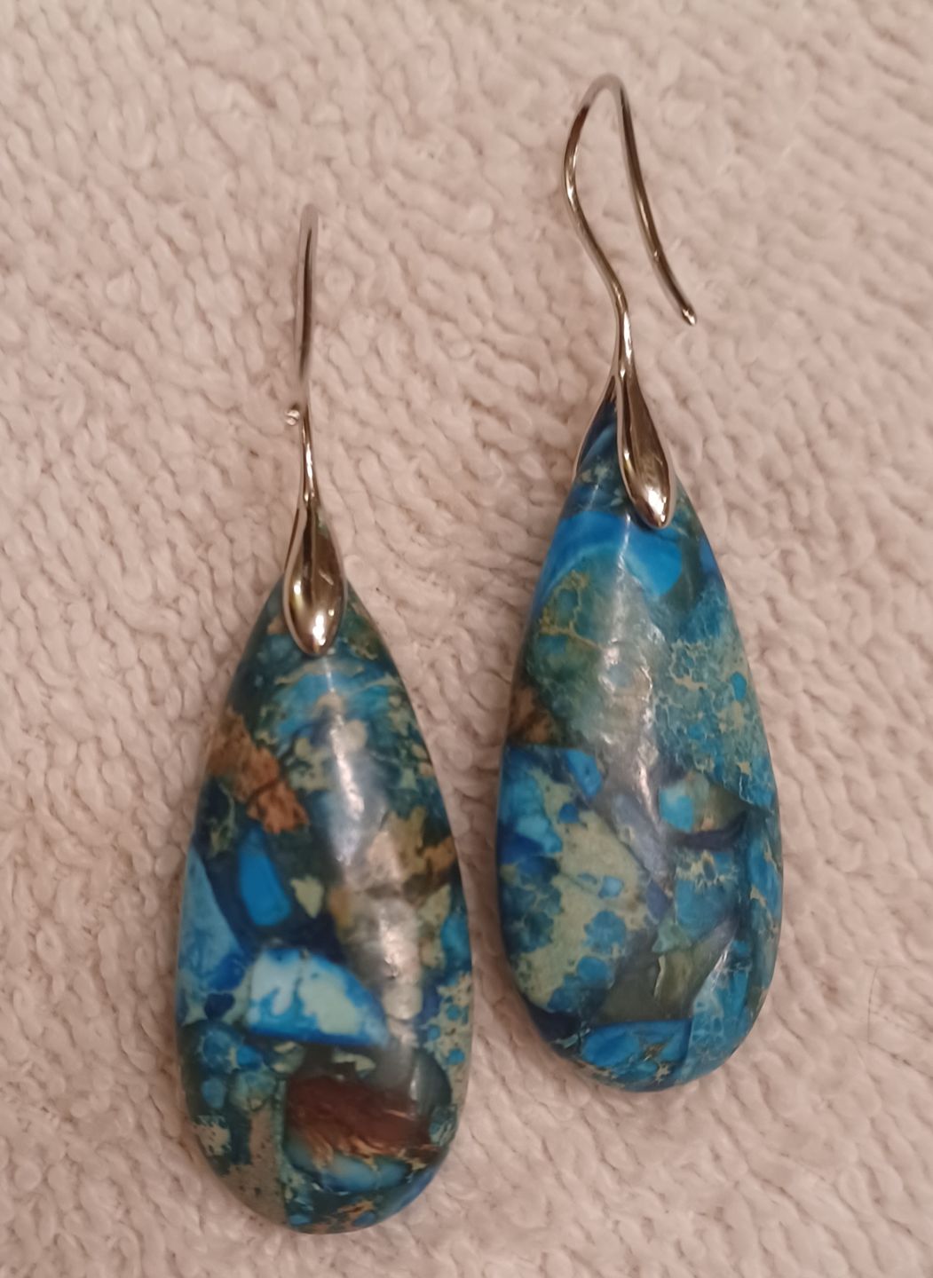Customer photo review of Ocean Energy Protection Teardrop Earrings