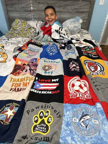 T-shirt quilt featuring bull dogs, soccer club by Adriana from MD