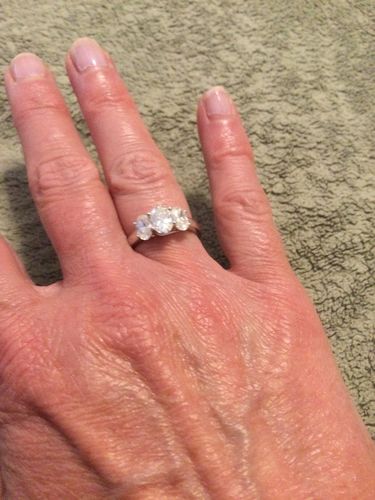 Customer photo review of Classic Three Stone Oval Cut Moissanite Engagement Ring