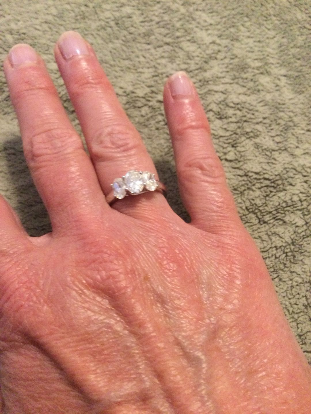 Customer photo review of Classic Three Stone Oval Cut Moissanite Engagement Ring