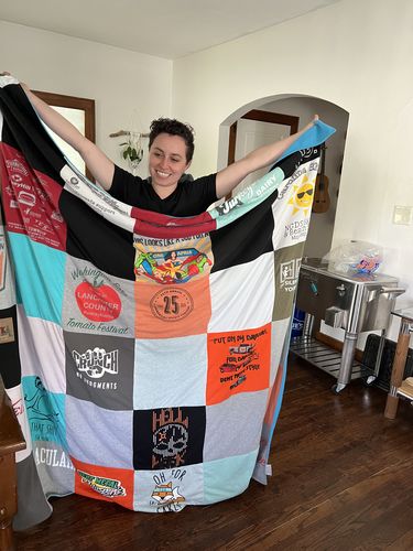 T-shirt quilt with music, hockey themes by Jenni from IL