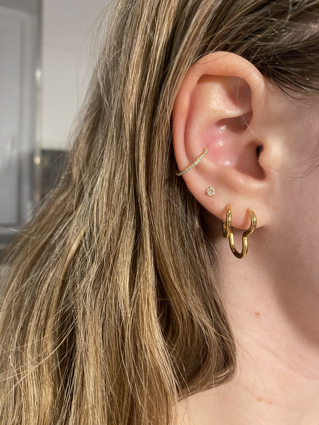 Customer photo review of Conch Clicker | Titan Piercing