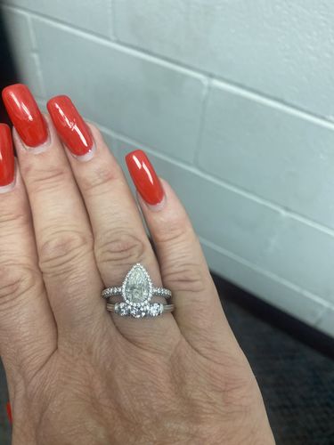 Customer photo review of Halo Pear Moissanite Triple Row Pave Engagement Ring