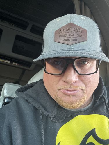 Customer photo review of Custom Leather Patch Trucker Hat - Richardson 112