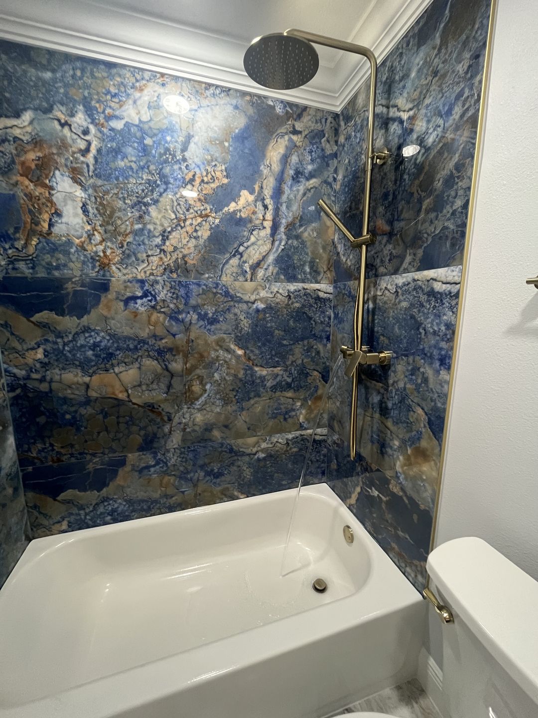 Customer photo review of Rain Shower System with Tub Spout and High Pressure 10" Rain Shower Head RB0880