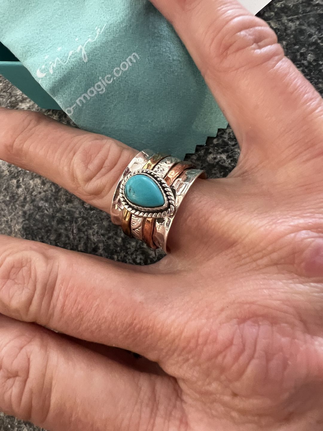 Customer photo review of Teardrop Turquoise Fidget Ring Sterling Silver