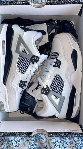Customer photo review of NIKE Air Jordan 4 Military Black