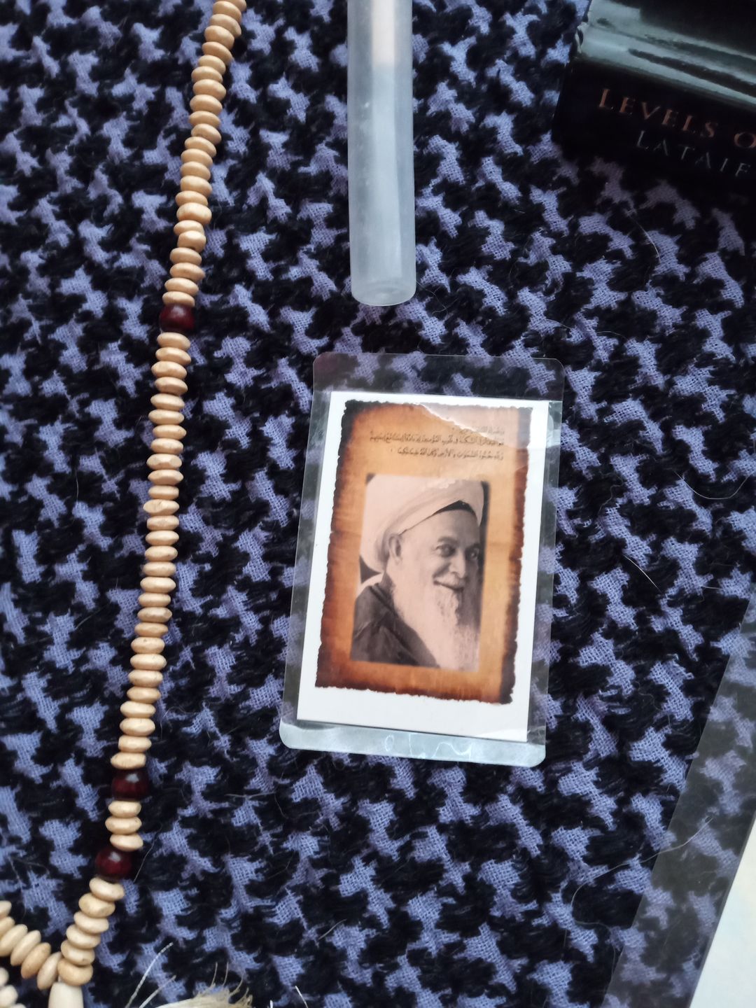 Customer photo review of Laminated Taweezes Pocket Wallet Small (1.5" x 2")