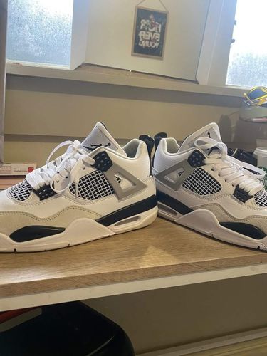 Customer photo review of NIKE Air Jordan 4 Military Black