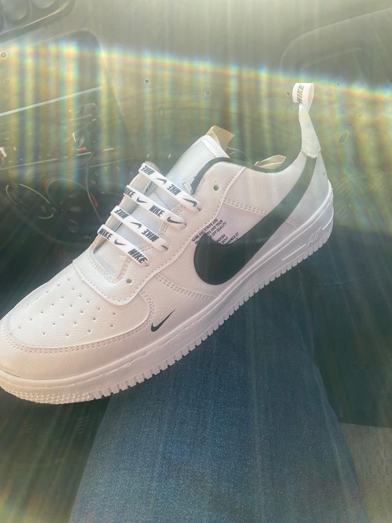 Customer photo review of Tenis 275 Blanco Negro