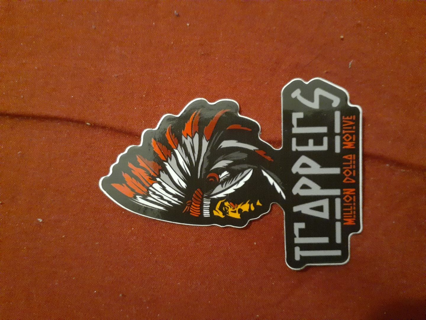 Customer photo review of Trappers Red on Black Sticker