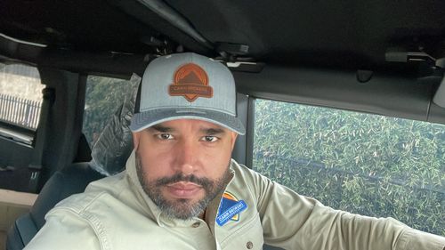 Customer photo review of Custom Leather Patch Trucker Hat - Richardson 112