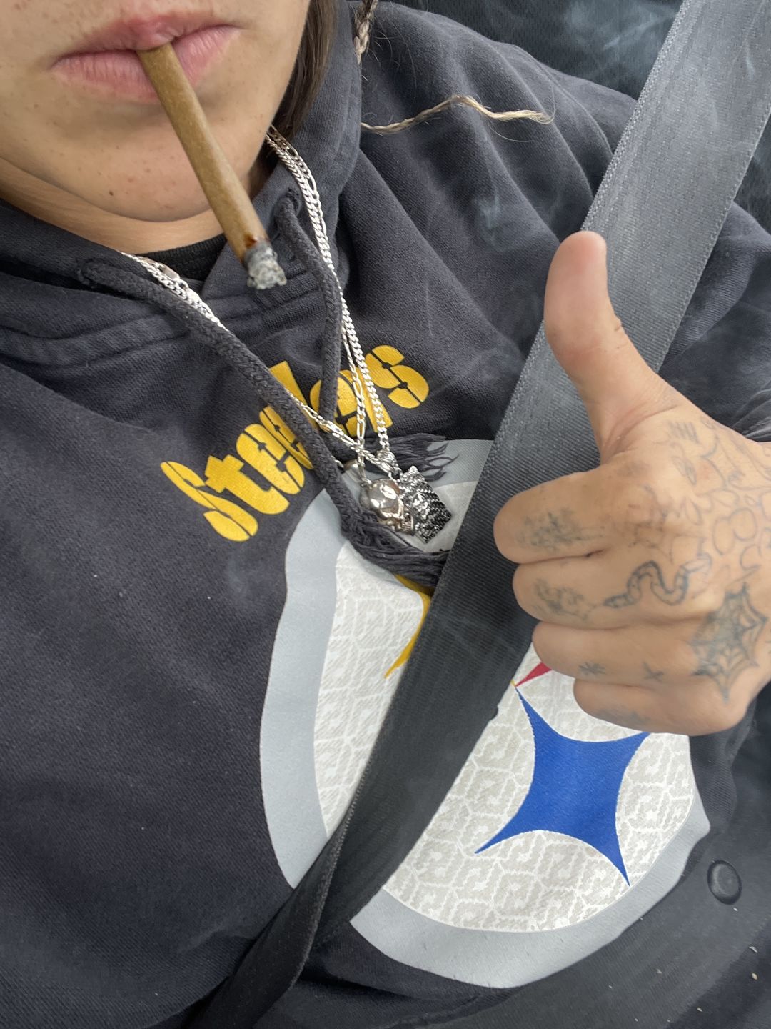 Customer photo review of LAUGH NOW, DIE LATER PENDANT