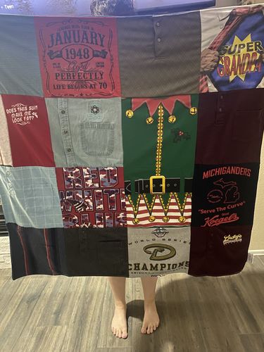 T-shirt quilt with sports, community involvement themes by Garry from AZ