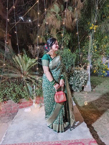 Customer photo review of Rubans Red Coloured Potli Handbag With Golden Embroidery And Pearls