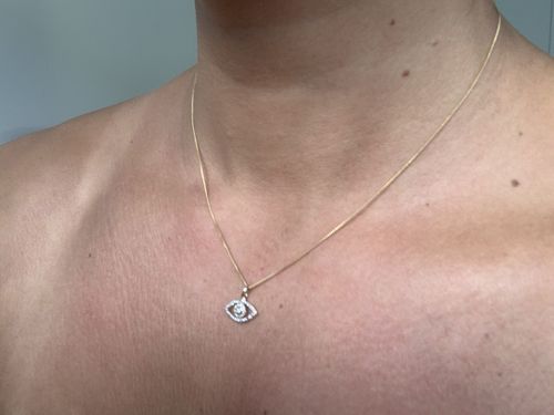 Customer photo review of Diamond Evil Eye Pendant in 9ct Yellow Gold