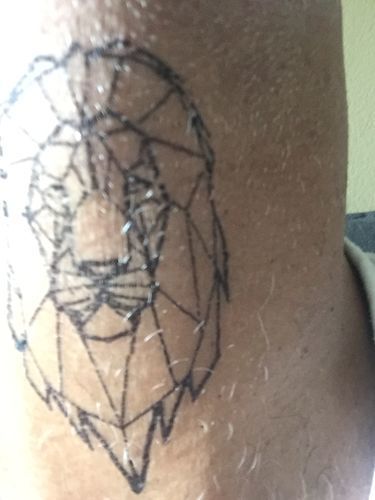 Customer photo review of Geometric Lion Tattoo - Semi Permanent