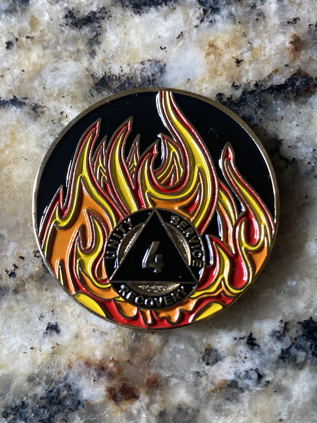 Customer photo review of 1 to 40 Year Sobriety Mint Twisted Flames Gold Plated AA Recovery Medallion/Chip/Coin - Black/Red/Orange/Yellow