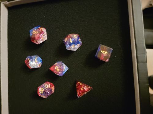 Customer photo review of URWizards D&D Blast Red&Blue Glass Engraved Dice Set
