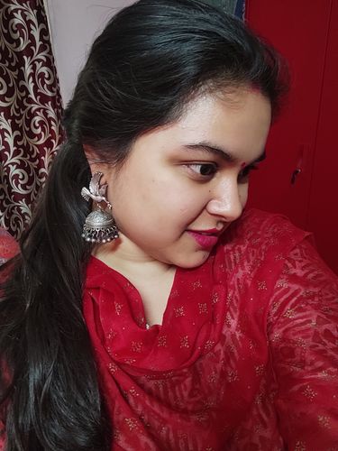 Customer photo review of Rubans Oxidised Silver Handcrafted Pegion Shaped Jhumka Earrings.