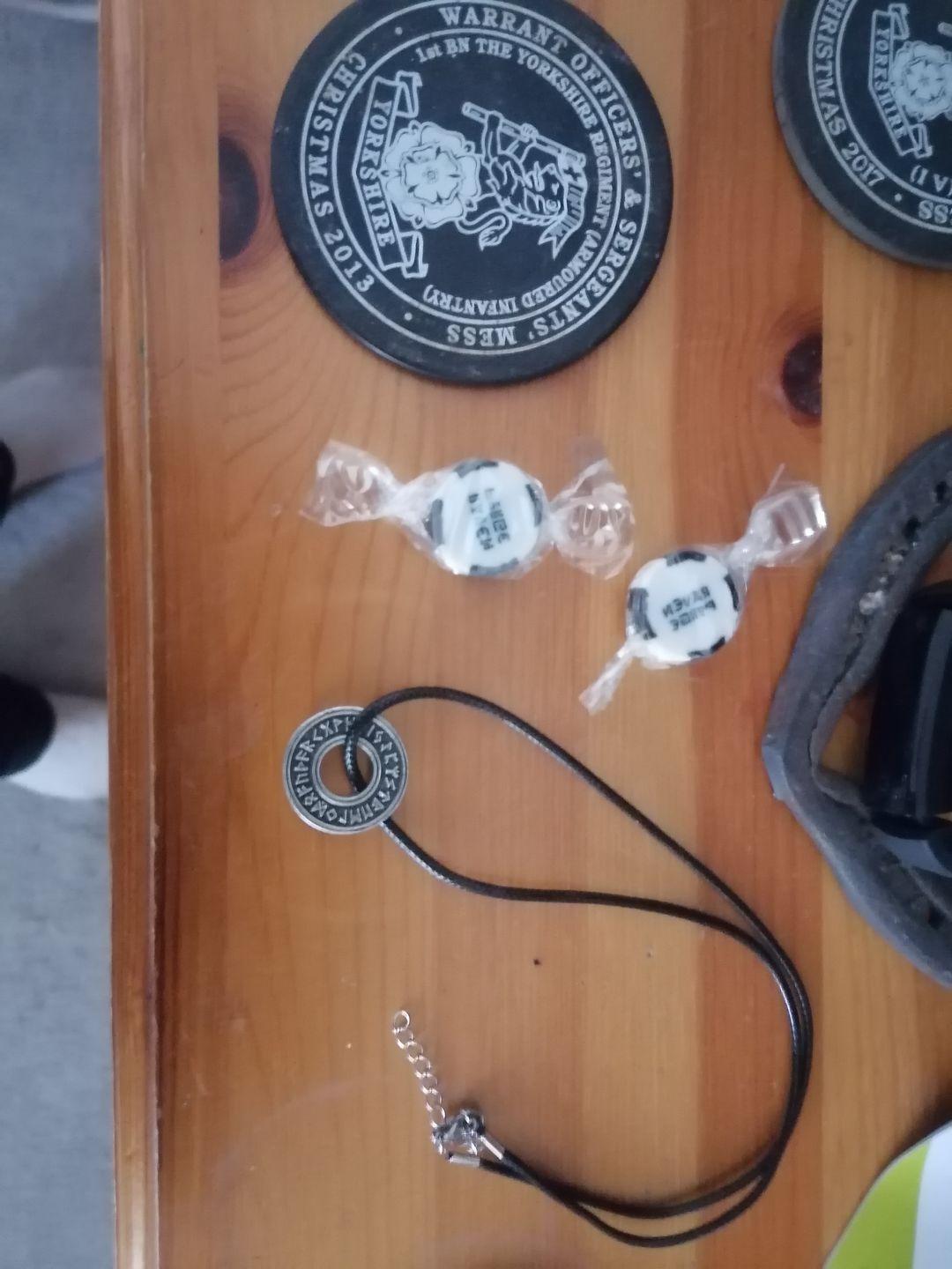 Customer photo review of Runed Coin Pendant