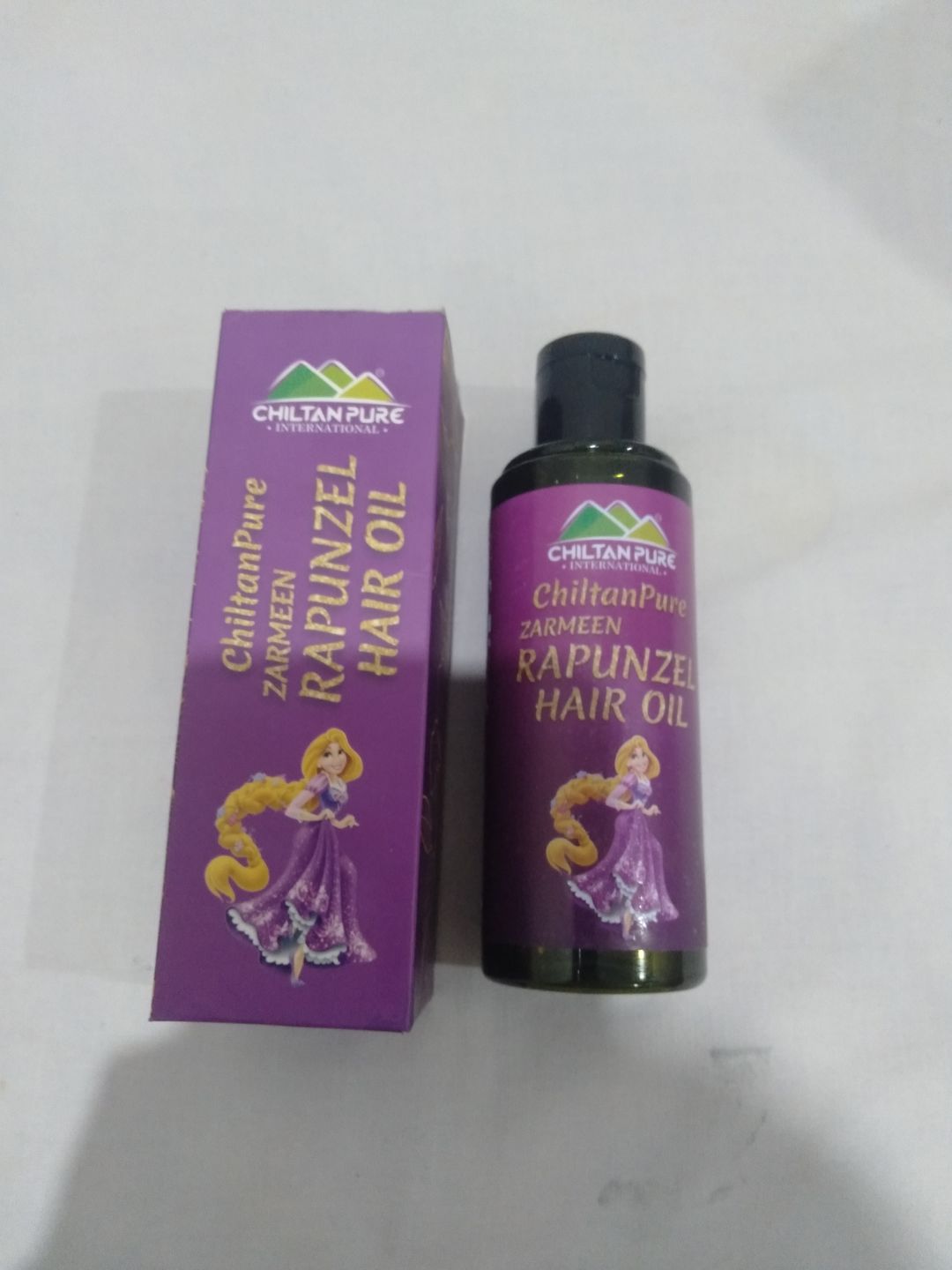 Customer photo review of Rapunzel Hair Oil - Combinations of Different Herbal Oils, Prevents From Dandruff & Hair Fall, Improves Hair Growth & Promotes Shiny, Strong Hair,,♀️👩 Women's First Choice