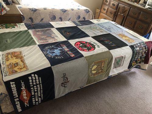 T-shirt quilt with travel, exploration themes by Theresa from FL