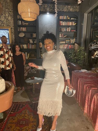 Customer photo review of Elegant Sequin Round Neck Fringed Long Sleeve Midi Dress