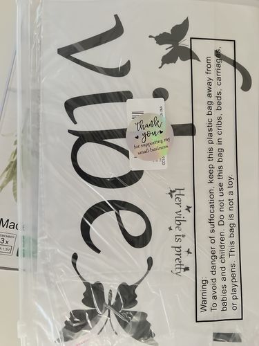 Customer photo review of Her Vibe Is Pretty Vibe Wall Decal
