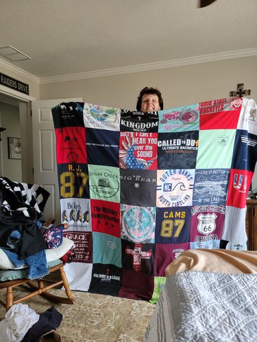 T-shirt quilt with military, travel themes by Anna from OK
