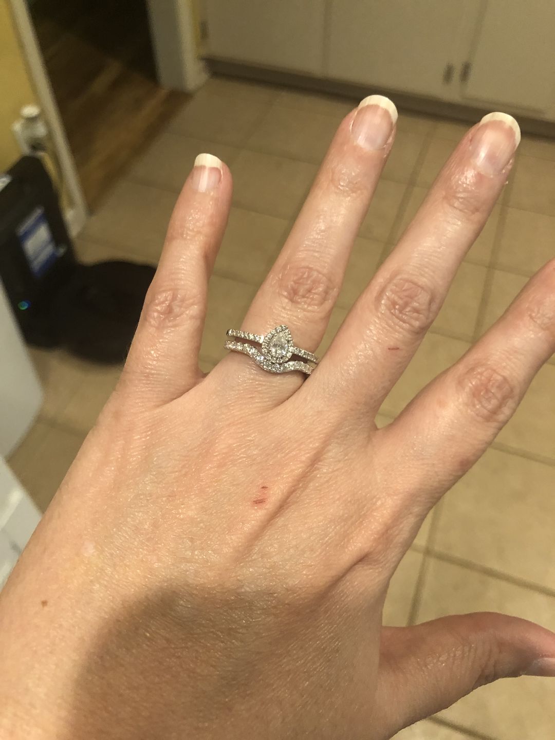 Customer photo review of Curved Pave Moissanite Half Eternity Wedding Band Stackable Ring