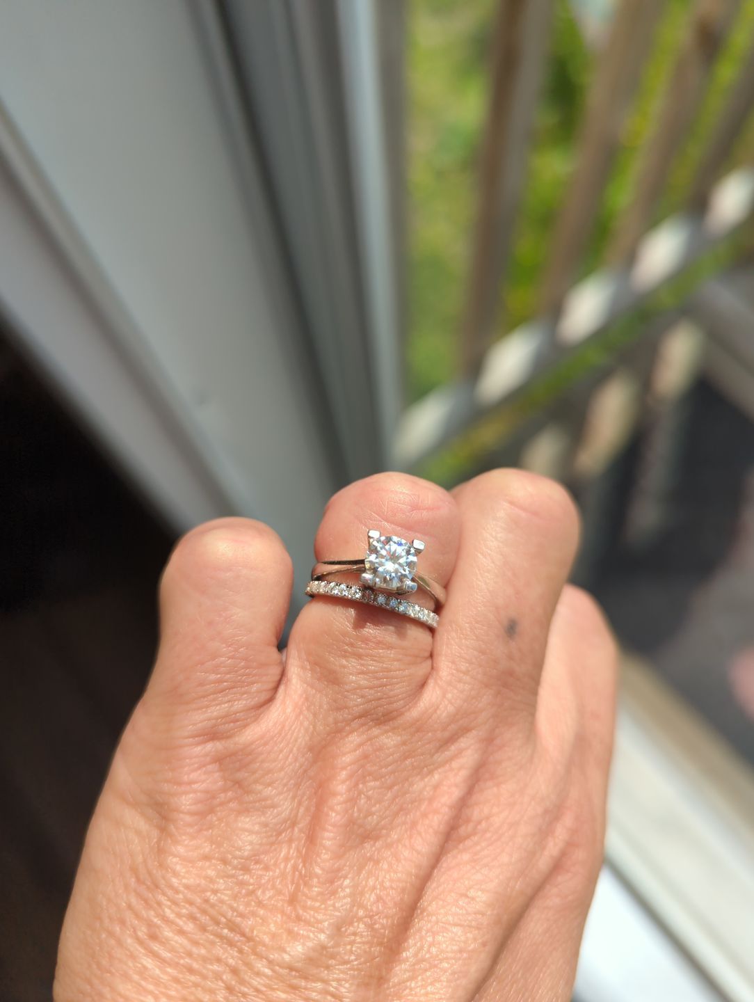 Customer photo review of Moissanite Round Half Eternity Sterling Silver Wedding Band Stackable Ring
