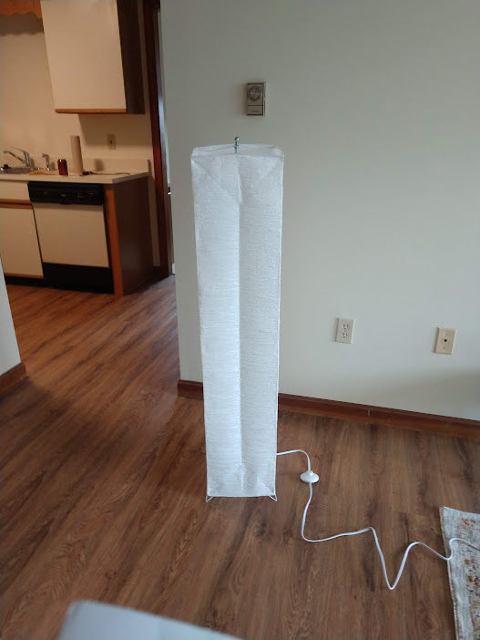 Customer photo review of Hako Crepe Paper Floor Lamp with Foot Switch, 4-FT Tall, 10-inch x 48-inch
