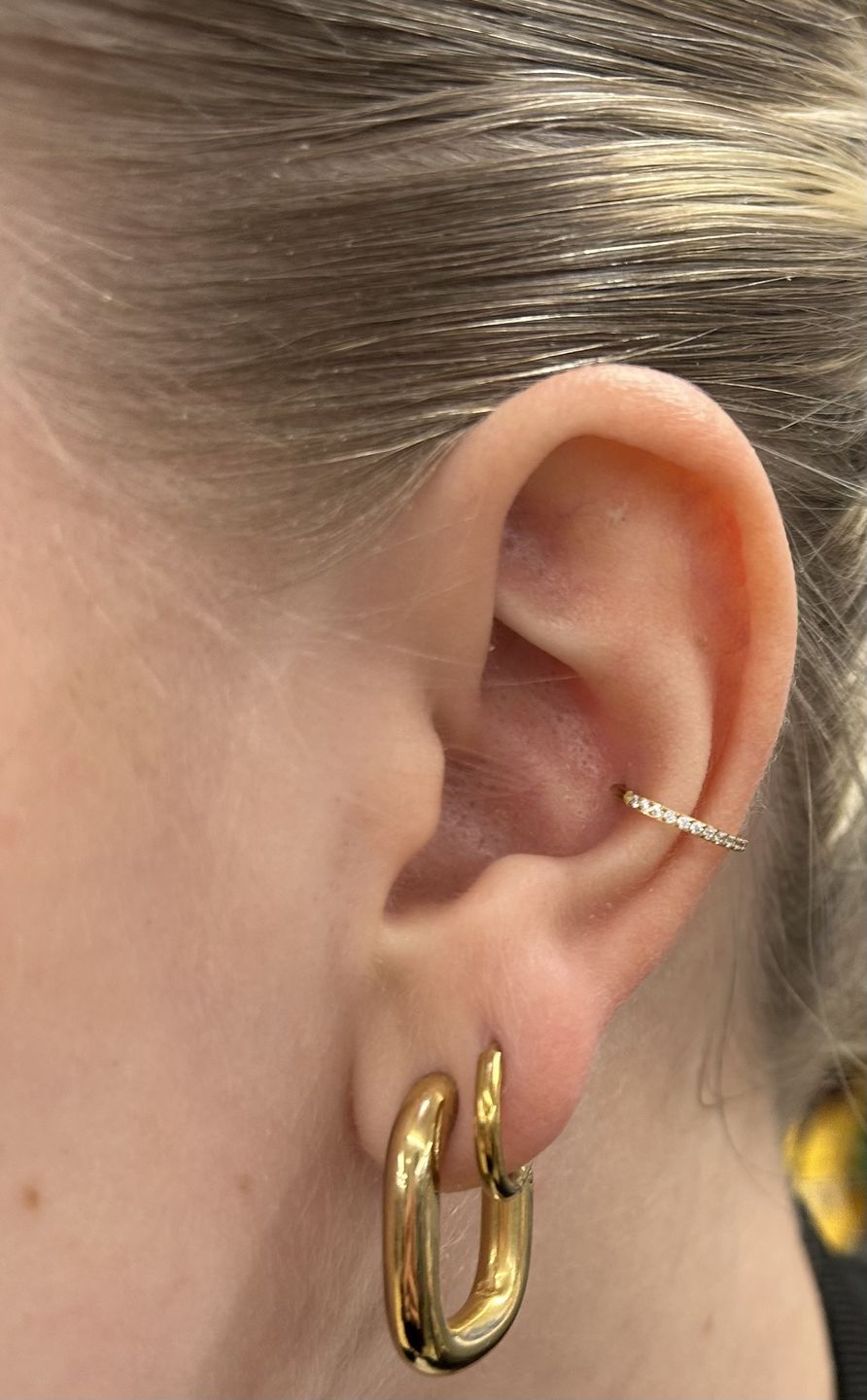 Customer photo review of Conch Clicker | Titan Piercing