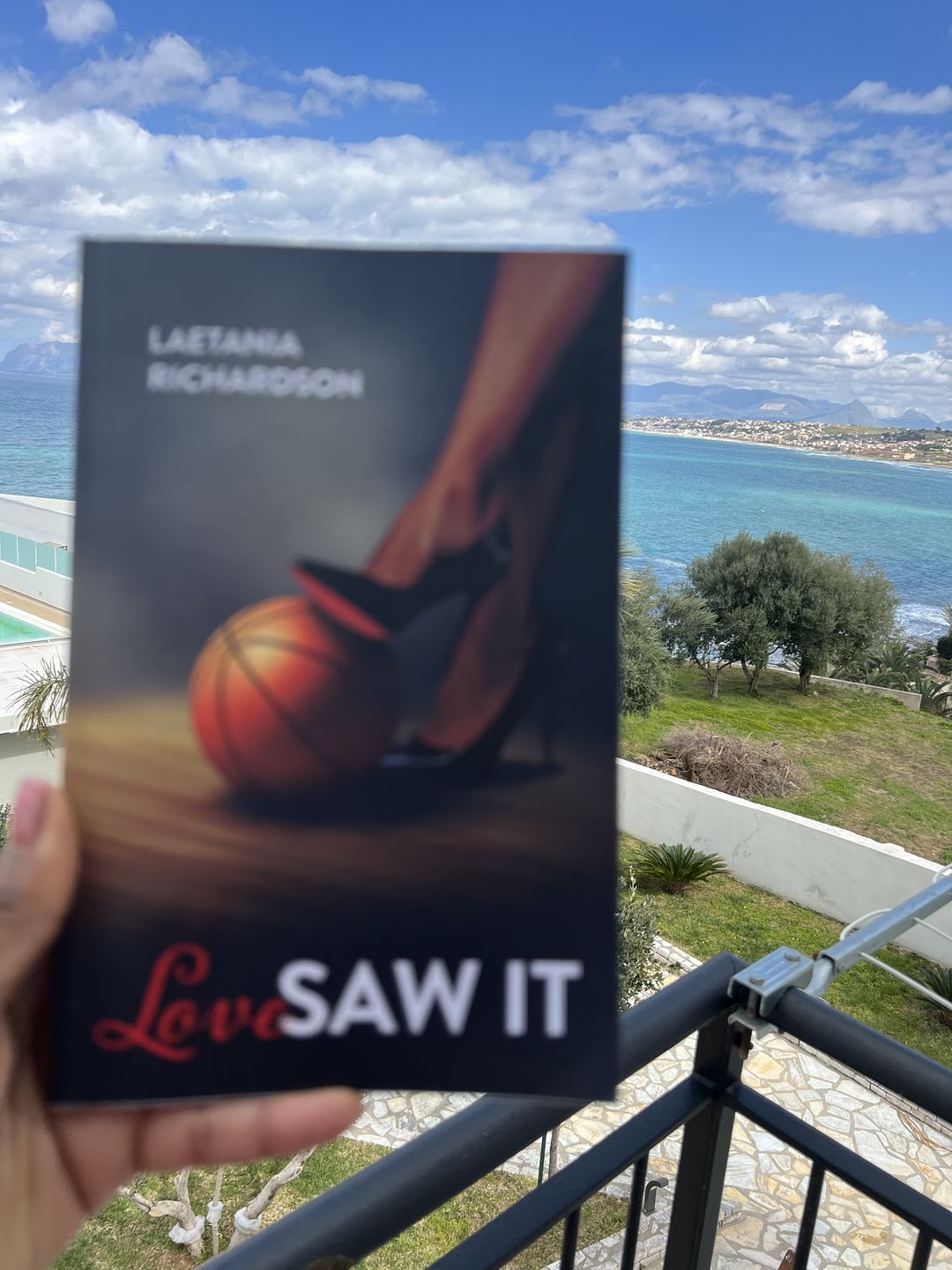 Customer photo review of Autographed Copy -“LOVE SAW IT”- by LAETANIA RICHARDSON