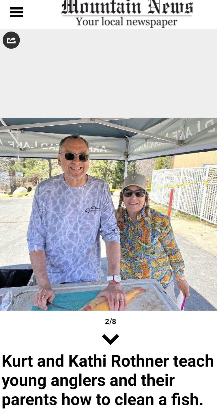 Customer photo review of Unbound Brown Tunic Fishing Shirt