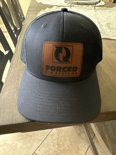 Customer photo review of Custom Leather Patch Trucker Hat - Richardson 112