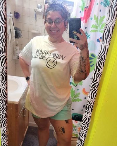Customer photo review of Salty Savage Unisex "THICC GIRLS CLUB" Oversized Tall Crew Tee | Rainbow Tie Dye/Black