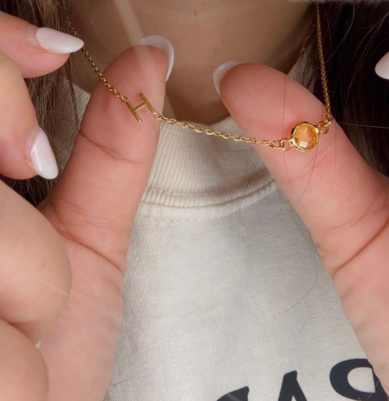 Customer photo review of Birthstone Initial Necklace