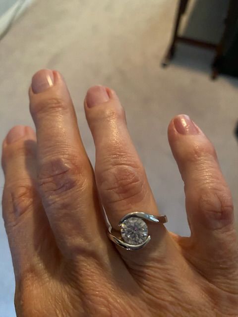 Customer photo review of Solitaire Tension Set Moissanite Bypass Engagement Ring
