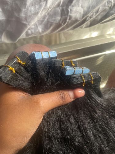 Customer photo review of Kinky Straight Seamless Tape In Extension 12A+Virgin Human Hair