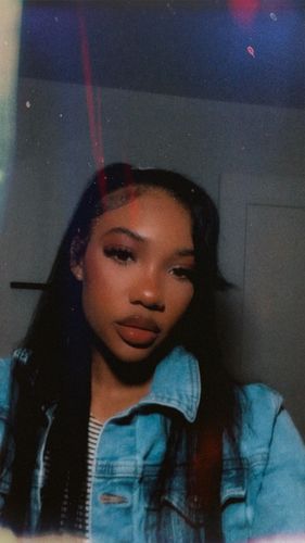 Customer photo review of Kinky Straight Seamless Tape In Extension 12A+Virgin Human Hair